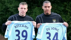 Nigel de Jong, right, and Craig Bellamy, left, joined Manchester City in January 2009 (Martin Rickett/PA)
