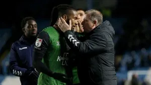 Kasey Palmer, in the green shirt, is greeted by Coventry manager Mark Robins after the Sky Blues’ 2-1 win at Sheffield Wedne