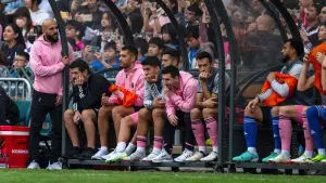 Inter Miami’s Lionel Messi, sixth from left, was left on the bench for his side’s friendly in Hong Kong (Louise Delmotte/AP)