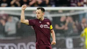 Lawrence Shankland scores from the spot as Hearts hit back to draw with Hibs