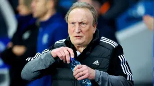 Rangers battle past Neil Warnock’s stubborn Aberdeen to join Celtic at top
