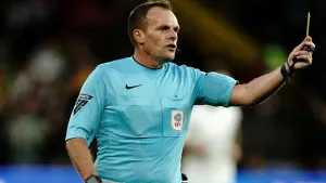 Referees, like Geoff Eltringham, pictured, could soon be showing blue cards (Aaron Chown/PA)