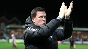 Gary Caldwell hails 10-man Exeter’s character in win over Burton