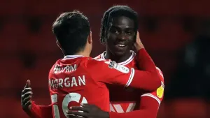 Jay Mingi (right) scored a late winner for Colchester (Adam Davy/PA)