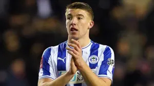 Lincoln’s impressive unbeaten run ended as Wigan snatch last-gasp victory