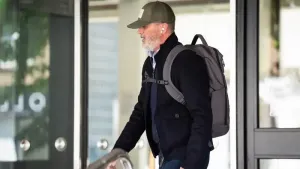 Football pundit Roy Keane told a court he was left ‘in shock’ after being allegedly ‘headbutted’ through doors during a Prem