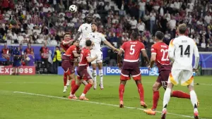 Niclas Fullkrug’s last-gasp header snatches Germany top spot in Group A