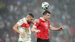 Turkey’s Merih Demiral (left) and Austria’s Michael Gregoritsch both found the net in Turkey’s win over Austria (Adam Davy/P