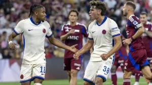 Christopher Nkunku, left, celebrates after scoring a penalty (Laurent Gillieron/Keystone via AP)