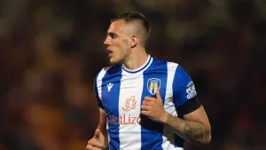 Late Ben Goodliffe strike earns Colchester share of points at Accrington