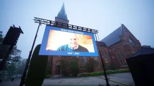 A screen outside Fryksande Church in Torsby displays a picture of Sven-Goran Eriksson in preparation for the former England 