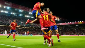 Spain’s Aymeric Laporte, centre, headed Spain into an early lead against Nations League rivals Serbia (Jose Breton/AP)