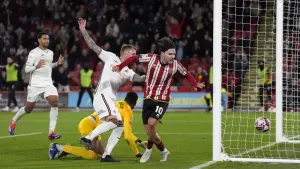 Josh Tymon’s own goal sees Sheffield United move up to third in Championship