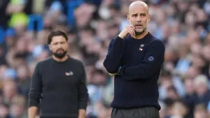 Manchester City manager Pep Guardiola and Southampton manager Russell Martin, left, on the touchline (Martin Rickett/PA)