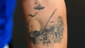 Finland’s Topi Keskinen has a tattoo featuring Wayne Rooney fishing (Bradley Collyer/PA)