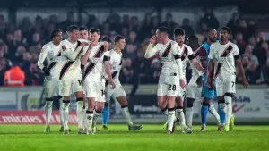 Lincoln ease past non-league Chesham to reach FA Cup second round