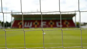 Woking move clear of relegation zone with win against Boston