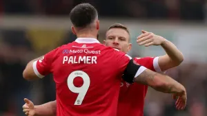 Wrexham climb into second place after easing past Exeter