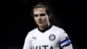 Huddersfield claim victory over Stockport thanks to early Lewis Bate own goal