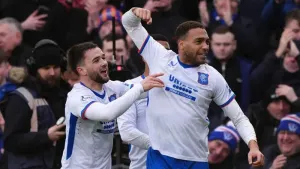 Cyriel Dessers still has ambitions at Rangers (right) (Andrew Milligan/PA)