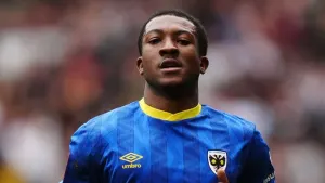 Josh Neufville’s sublime strike helps keep promotion-chasing Wimbledon on track