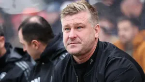 Karl Robinson guided Salford to another win at his former club (Barry Coombs/PA)