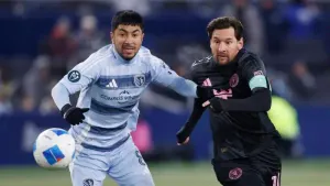 Sporting Kansas City midfielder Memo Rodríguez, left, and Inter Miami forward Lionel Messi compete for the ball (Colin E Bra