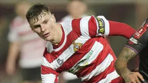 Rob Street on target as 10-man Doncaster edge lowly Morecambe to go third