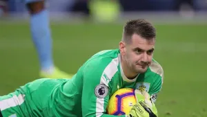 Goalkeepers will concede a corner if they hold onto the ball for more than eight seconds from next season (Richard Sellers/P