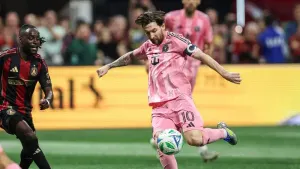 Inter Miami forward Lionel Messi (10) attempts a shot against Atlanta United midfielder Tristan Muyumba, left, during the fi