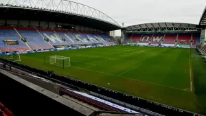 Luke Robinson gives managerless Wigan victory over Cambridge