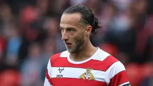 Doncaster and AFC Wimbledon share spoils in battle for automatic promotion