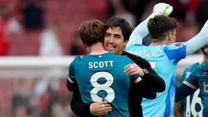 Bournemouth manager Andoni Iraola, right, and substitute Alex Scott, left, embrace at the final whistle PA)