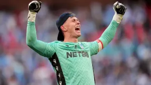 Crystal Palace goalkeeper Dean Henderson celebrates their FA Cup final win (Adam Davy/PA).