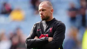 Liverpool assistant coach John Heitinga is a contender for the Ajax job (Mike Egerton/PA)
