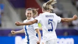 Katariina Kosola, left, celebrates with Emma Koivisto after scoring Finland’s winner (Anthony Anex/Keystone via AP)