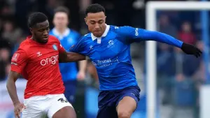 Reid clinches points for Hartlepool against 10-man Braintree