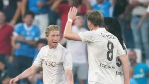 Scott McTominay and Kevin De Bruyne score as Napoli begin title defence with win