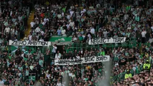 Celtic fans hold up protest banners in the Parkhead stands (Steve Welsh/PA)