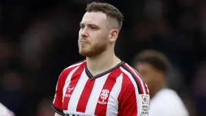 Lincoln see off Luton after late drama