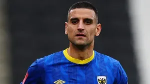 Omar Bugiel stars as Wimbledon edge out Wycombe
