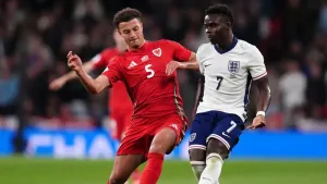 Ethan Ampadu (left) and Bukayo Saka battle for the ball during Wales’ 3-0 friendly defeat to England at Wembley (John Walton