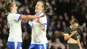 Lucy Bronze celebrates her goal with Ella Toone (Nick Potts/PA)