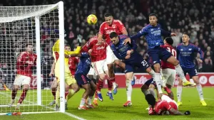 Arsenal miss chance to pull further clear at top as stubborn Forest claim point