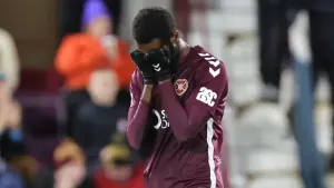 Derek McInnes proud of Hearts resilience to win after Beni Baningime red card