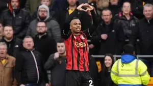 Junior Kroupi and Alex Scott give Bournemouth hard-fought win at Wolves