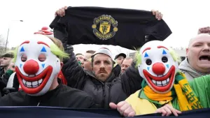 Man Utd supporters wear clown masks in protest ahead of Fulham match