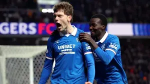 Rangers close gap on leaders Hearts with victory over 10-man Kilmarnock