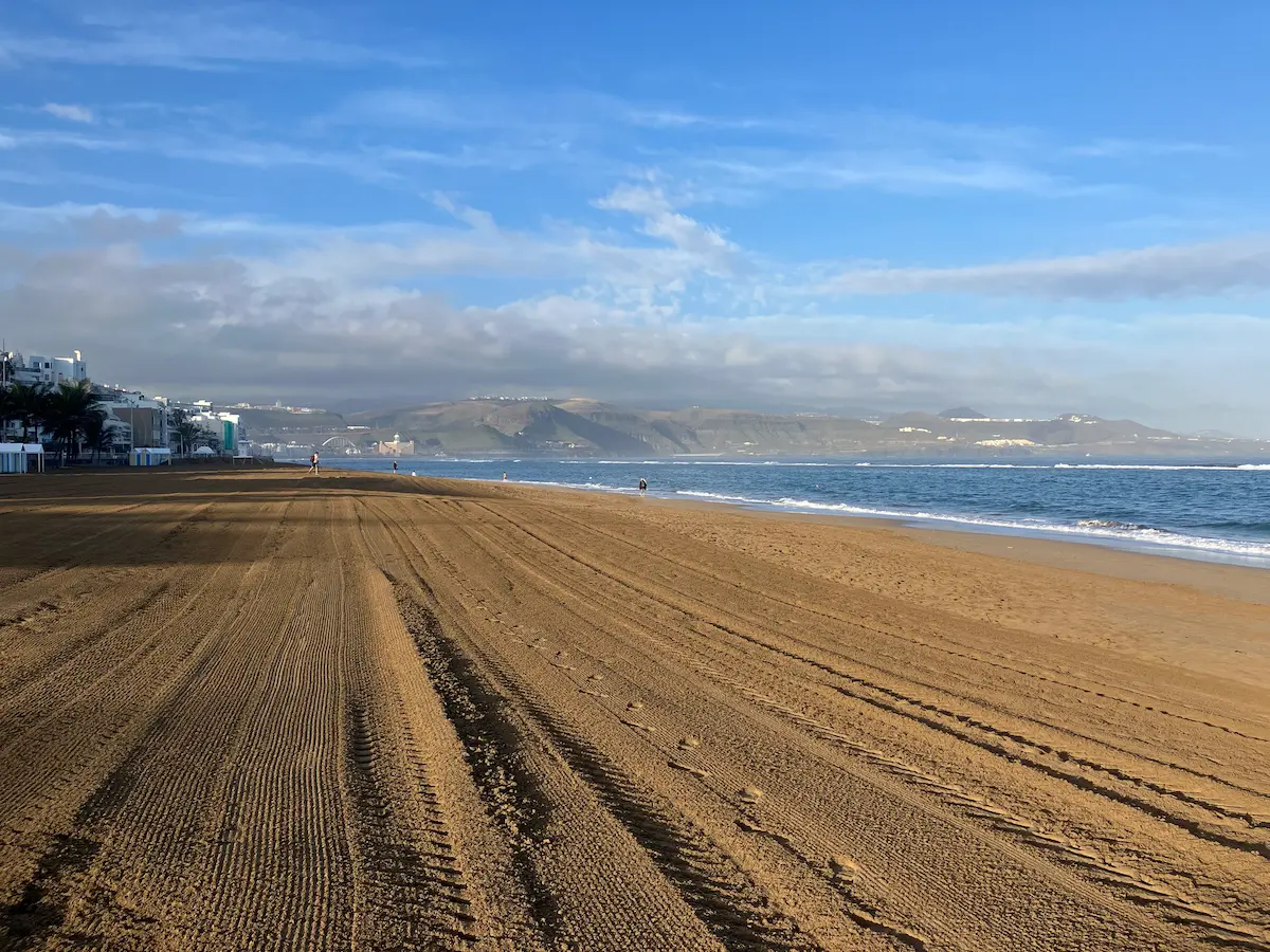 This early morning view of Playa de Las Canteras shows a rare glimps into the beach as few tourists ever see it