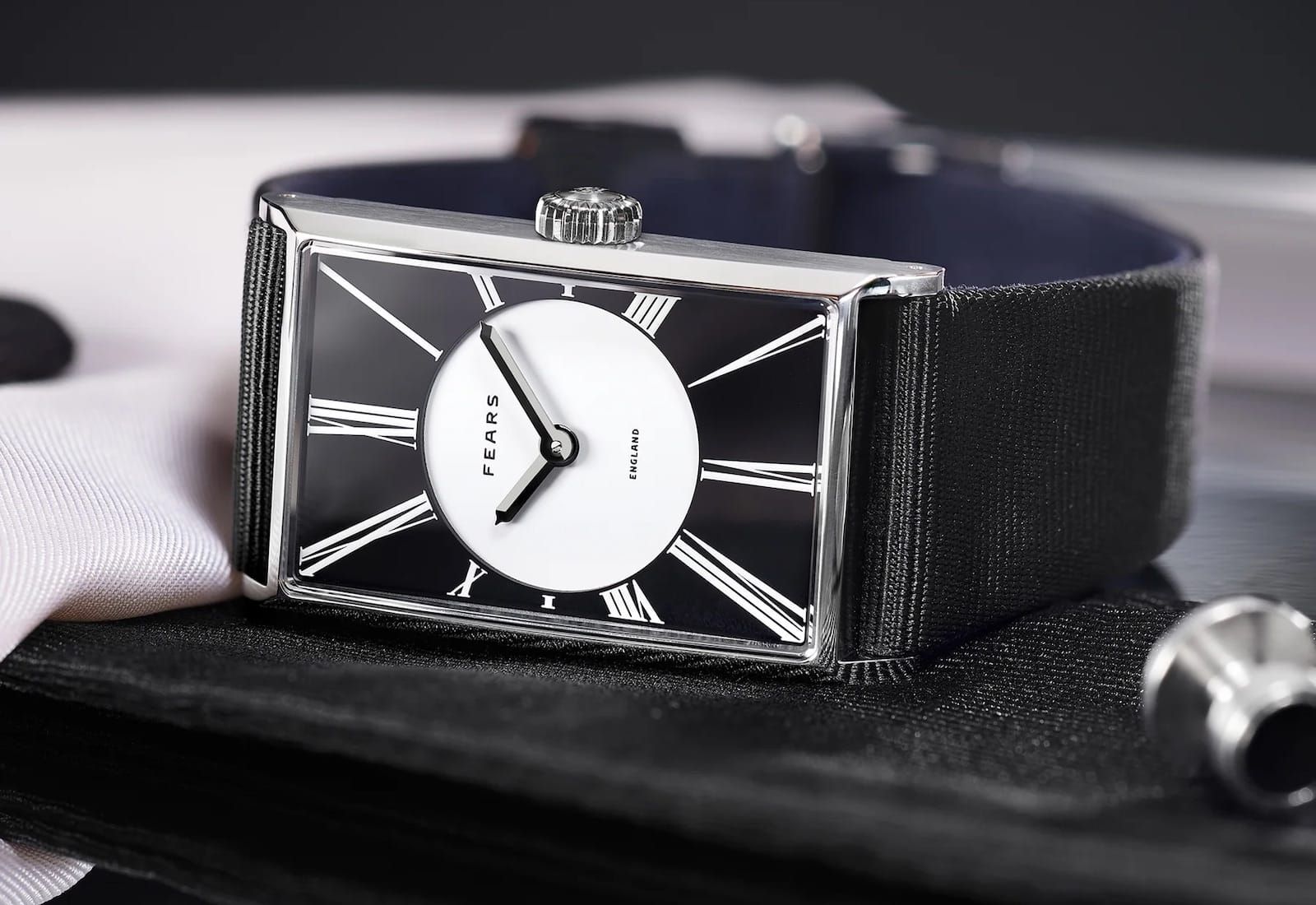 Fears Swaps Hobnail for Onyx on Its Classy Rectangular Watch